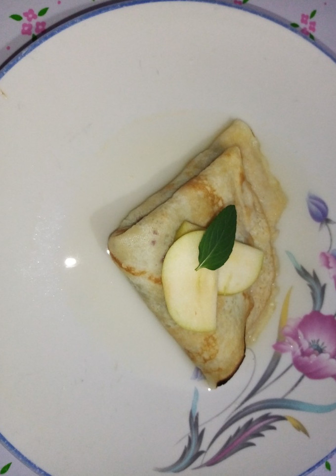Una foto de Crepas flameada con mermelada