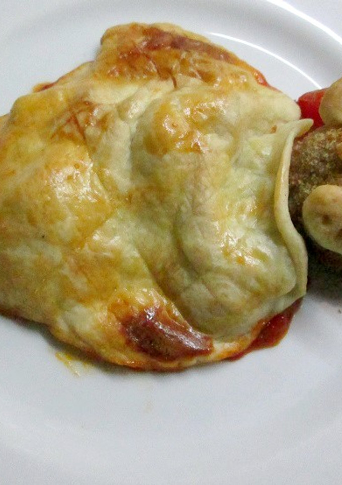 Una foto de Albóndiga con verduritas y hojaldre al horno