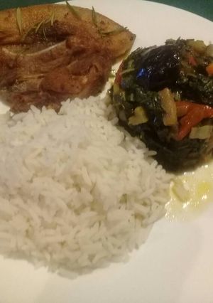 A picture of Spinach with brinjal and pork.