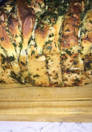 Una foto de Pan de ajo y perejil