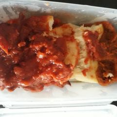 A picture of Boiled yam with tomato sauce.