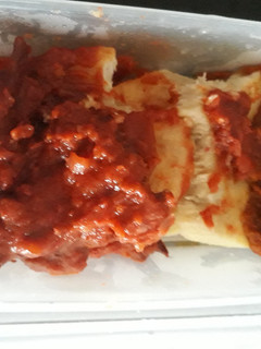 A picture of Boiled yam with tomato sauce.