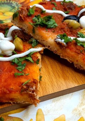 Une photo de Pizza carré