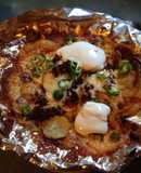 Nachos hechos con papa, chorizo y tocino
