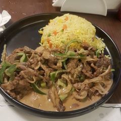 A picture of Fried rice with shredded beef sauce.