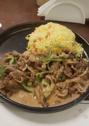 A picture of Fried rice with shredded beef sauce.