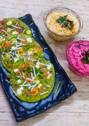 A picture of Spinach Oats Uttapam with Coconut chutney and Beetroot Dip.