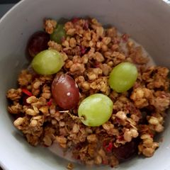 A picture of Breakfast Granola with grapes. 😘.
