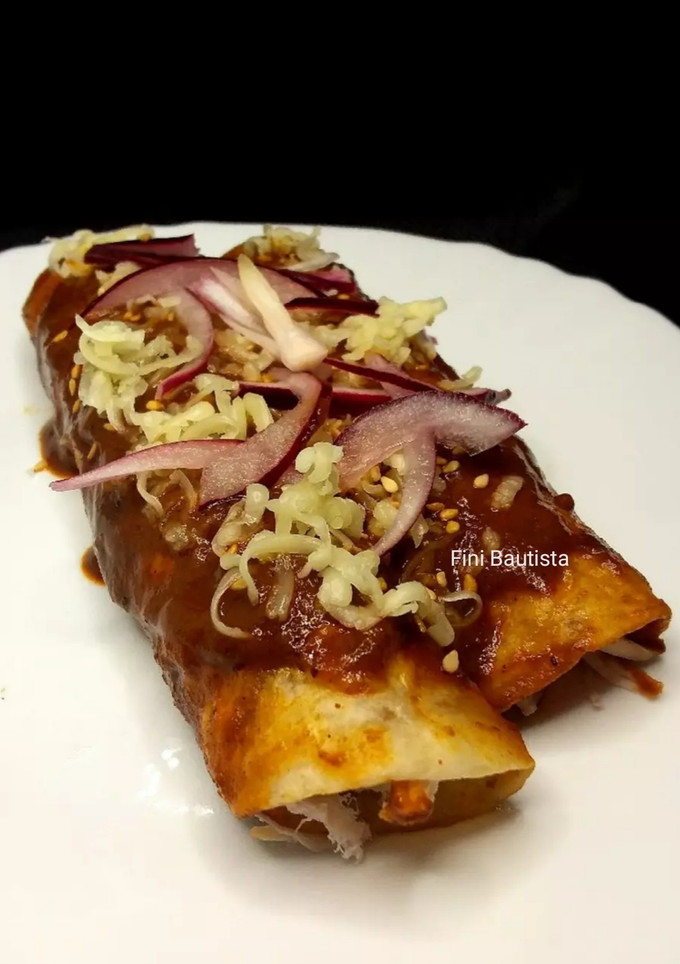 Una foto de Enchilada de pollo con mole