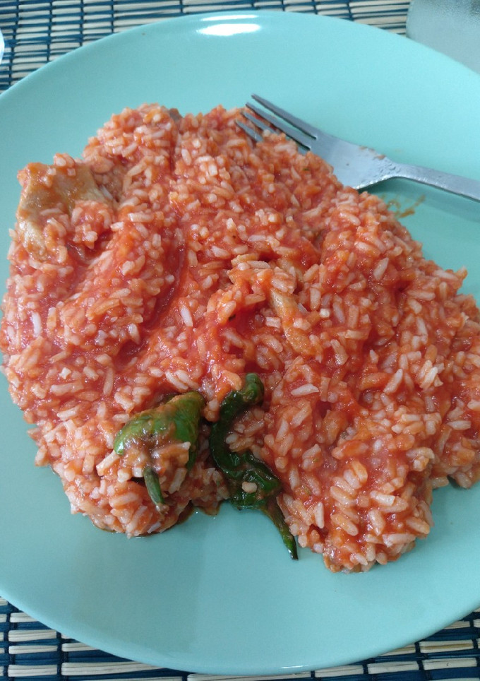 Una foto de Arroz con tomate y panceta