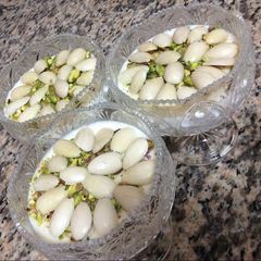 Lebanese pudding (mhalabieh with honey) A picture of Lebanese pudding (mhalabieh with honey).