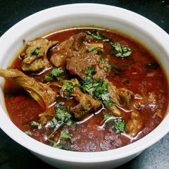 A picture of Resturant style special punjabi mutton curry.