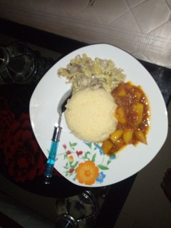 A picture of Cus-cus with potatoe stew.
