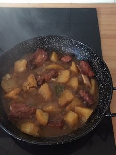 Una foto de Patatas con costillas