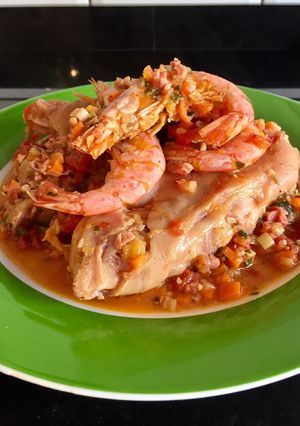 Una foto de Pies de cerdo con langostinos