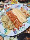Arroz saborizado, palmitos, cherry y queso