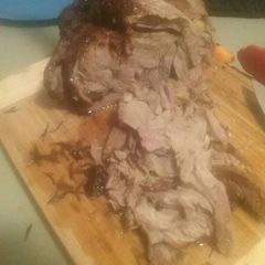 A picture of Garlic and rosemary roast lamb.