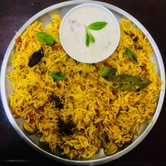 A picture of Tomato Pulao.