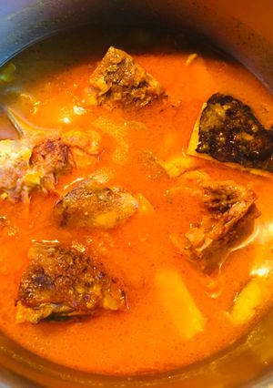 A picture of Olives with fish head stew.