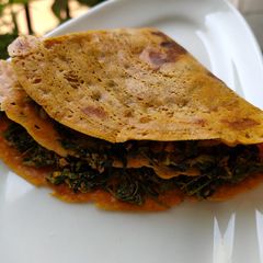 Methi stuffed besan chilla A picture of Methi stuffed besan chilla.