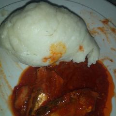 A picture of Sakwara with stew and sardine.