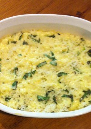 Una foto de Tian de arroz con calabacitas