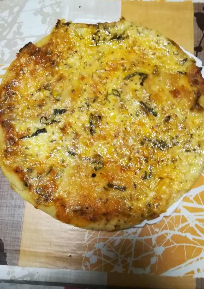 Una foto de Pizza Margarita