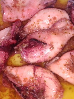 Una foto de Chipirones a la plancha con salsa verde