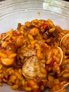 Una foto de Tapa de Arroz de pulpo y chirlas 🐙🐙🐙🐙🐙