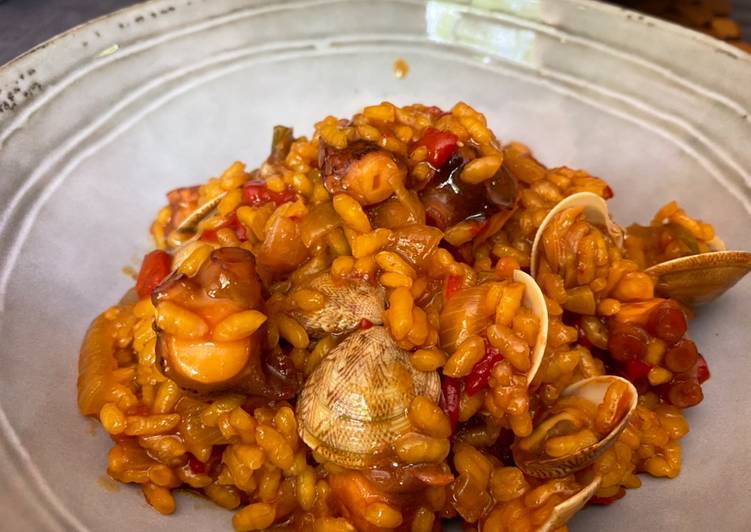Tapa de Arroz de pulpo y chirlas 🐙🐙🐙🐙🐙