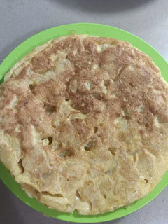 Una foto de Tortilla de patata y ajo en polvo