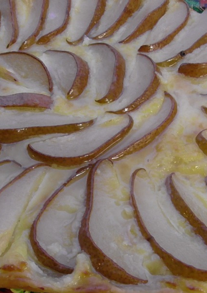 Una foto de Postre de pera o manzana