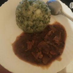 A picture of Mukimo and beef stew.