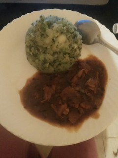 A picture of Mukimo and beef stew.