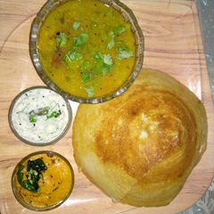 Dosa,tomato chutney, coconut chutney A picture of Dosa,tomato chutney, coconut chutney.