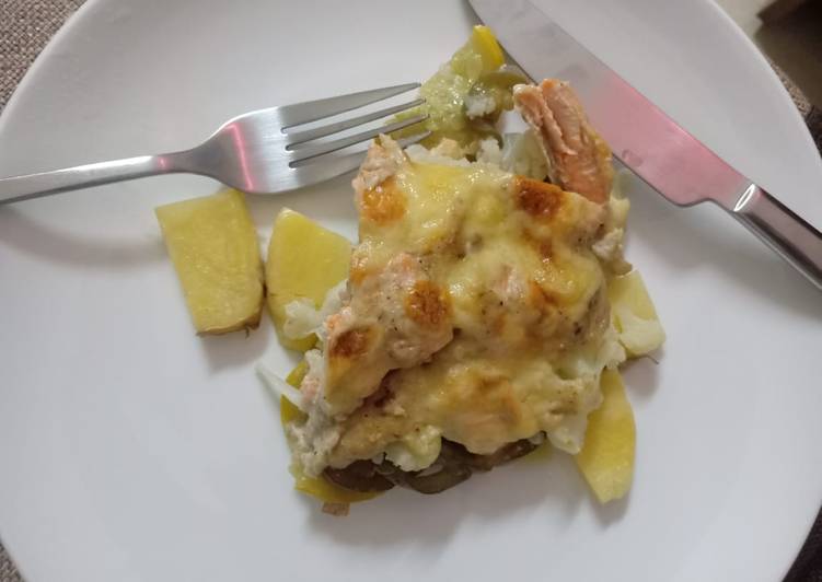 Potato bake with mushroom sauce and salmon