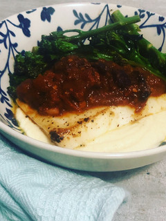 A picture of Calamari with spicy chorizo sauce and cauliflower puree.