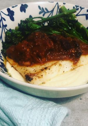 A picture of Calamari with spicy chorizo sauce and cauliflower puree.