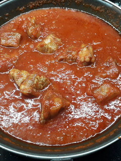 Una foto de Tomate frito con costillas de cerdo