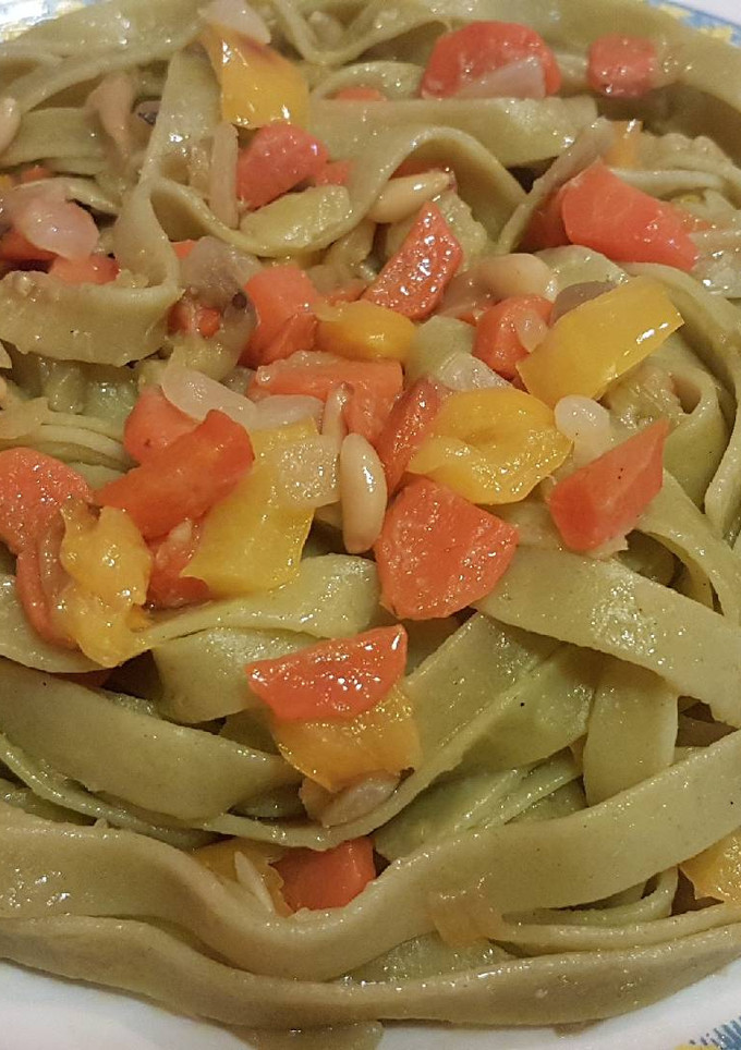 Una foto de Nidos de espinacas con verduras a mi manera