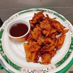 A picture of Crispy Onion Fritters.