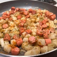 A picture of Skillet potatoes & sausages.