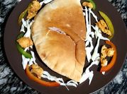 A picture of pita bread and chicken