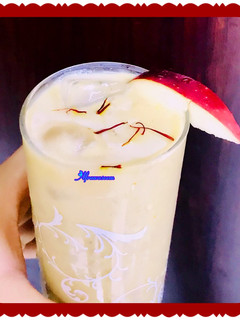 A picture of Apple & oats smoothie with dash of saffron.