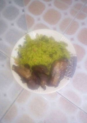 A picture of Fried Rice and chicken.