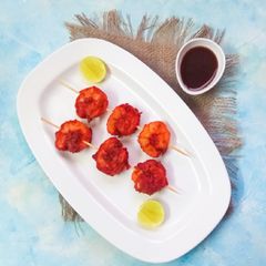 A picture of King prawn satay.