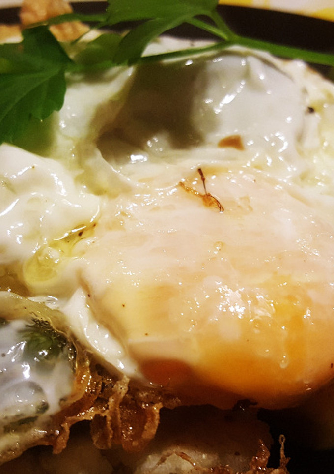 Una foto de Torto de maíz con ternera, pimientos y huevo