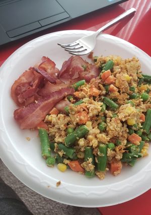 A picture of Scrambled Eggs with Bacon.
