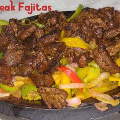 A picture of Sizzling Steak Fajitas.