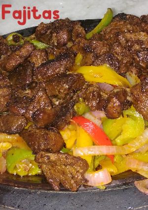 A picture of Sizzling Steak Fajitas.